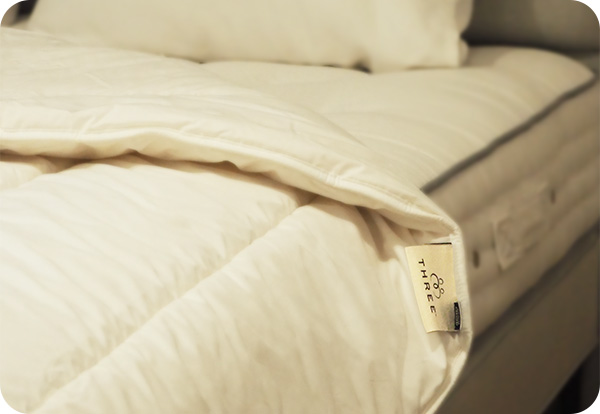 Innovative design at Devon Duvets, where customer feedback inspires unique bedding solutions like the patented folding pillow and THREE Duvets system.