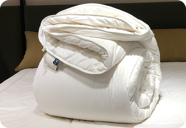 Devon Duvets' luxurious fabric options for custom bedding, ensuring breathable and temperature-regulating sleep comfort.