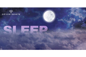 An image of fluffy white clouds against a light blue sky, representing the comfort, breathability and moisture wicking abilities of Devon Duvets' wool bedding, promoting a better night's sleep.