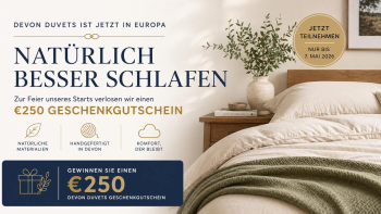 duvet, pillow with plant and world map in distance. 
