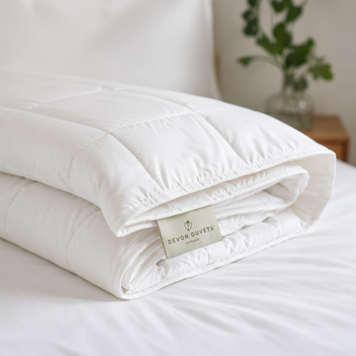 Clearance Botanic Lightweight box-stitched duvet folded on a white bed