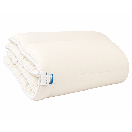 100% wool mattress topper folded on white background