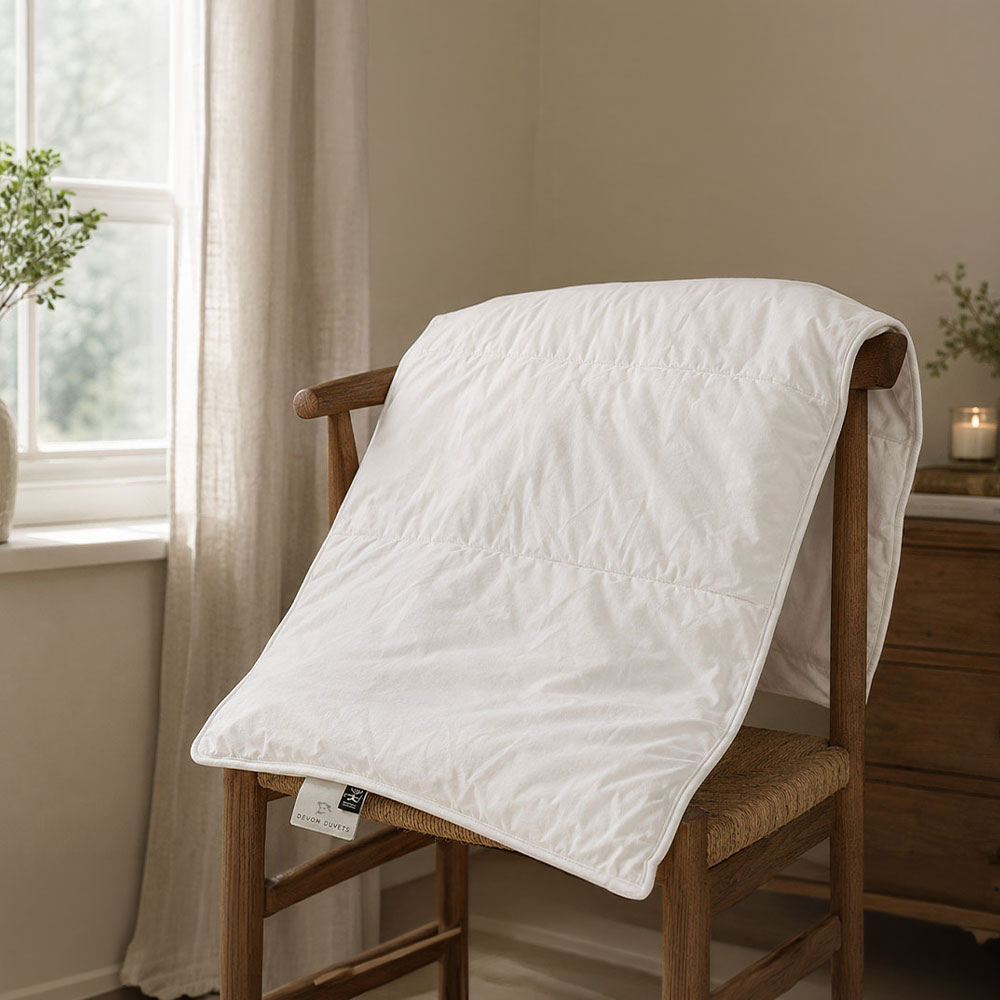 Wool pillow filling and washed casing air drying separately.