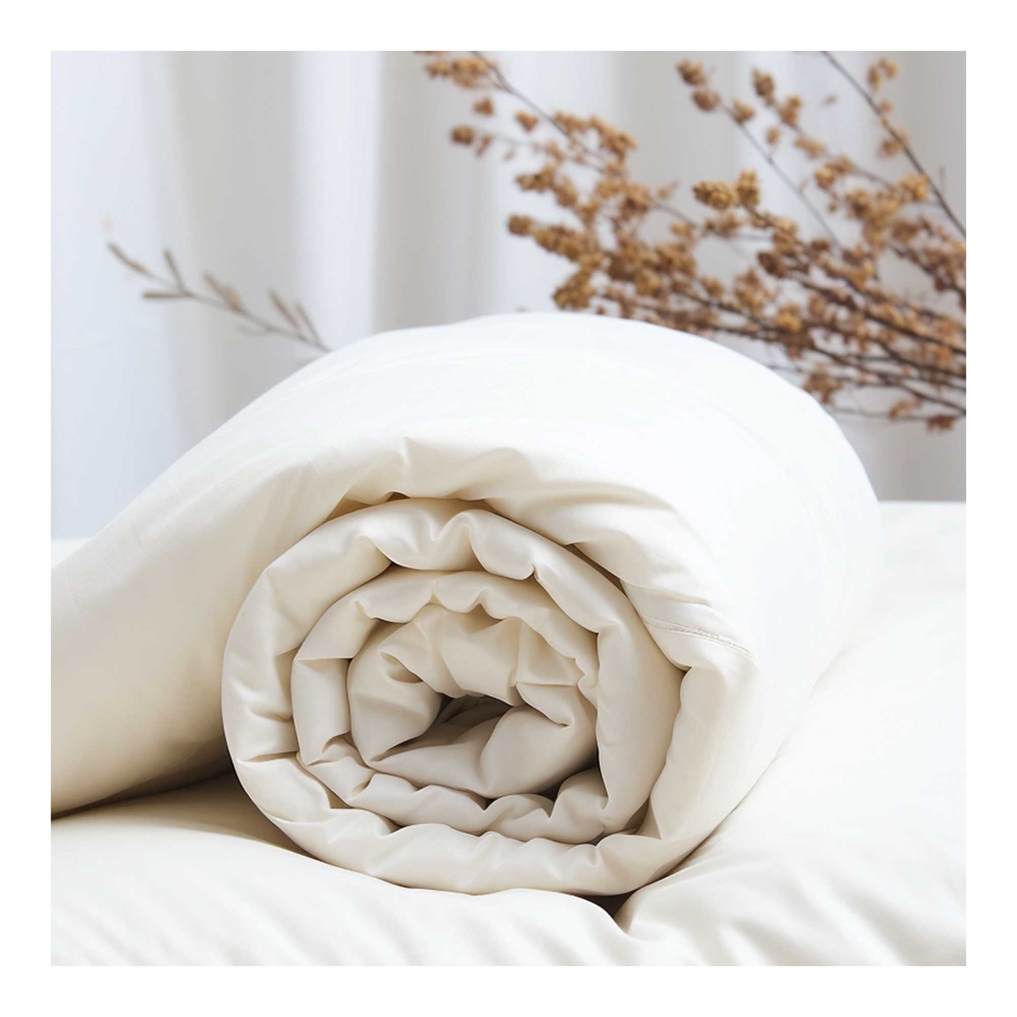 Artistic shot of the Devon Closewool wool duvet with a focus on its plush texture.