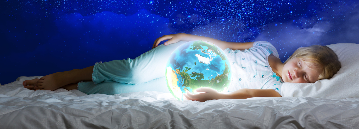 a child sleeping with a globe to represent eco friendly products from Devon Duvets.