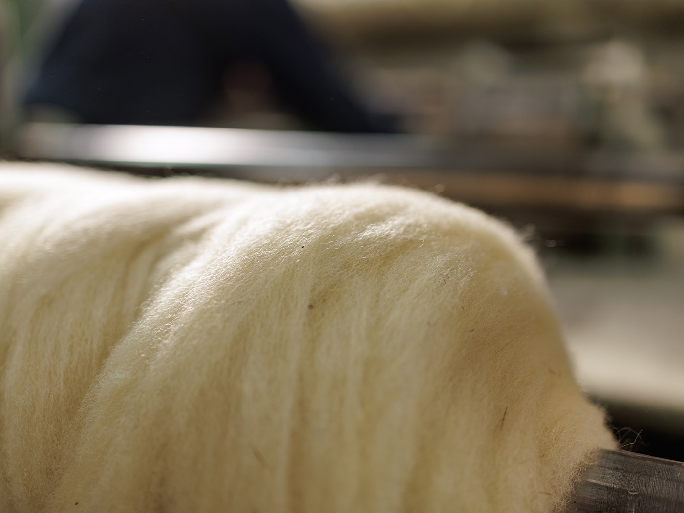 Wool being carefully washed in a textile processing facility
