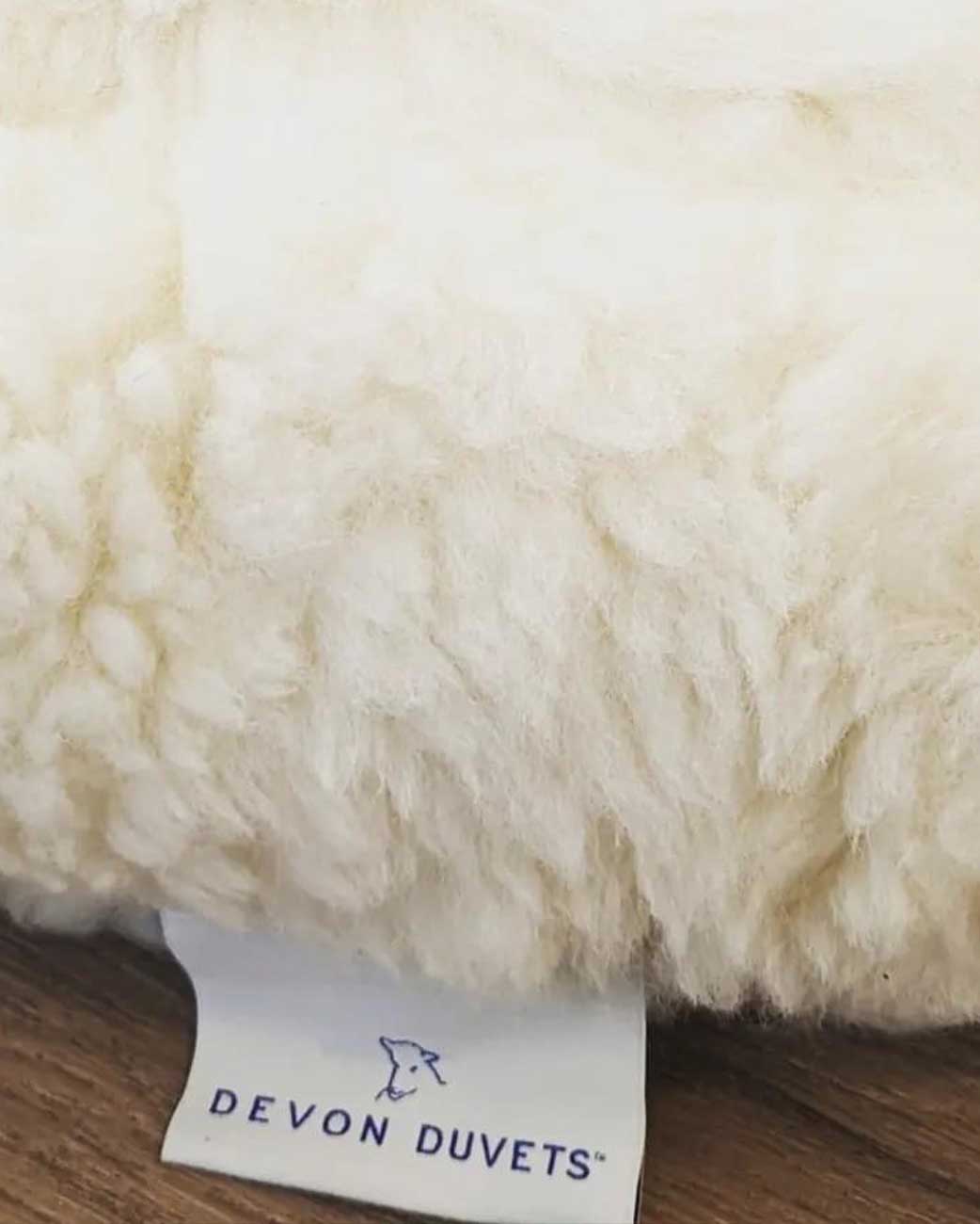 Signature Devon Duvets label, symbolising handcrafted quality and authenticity.