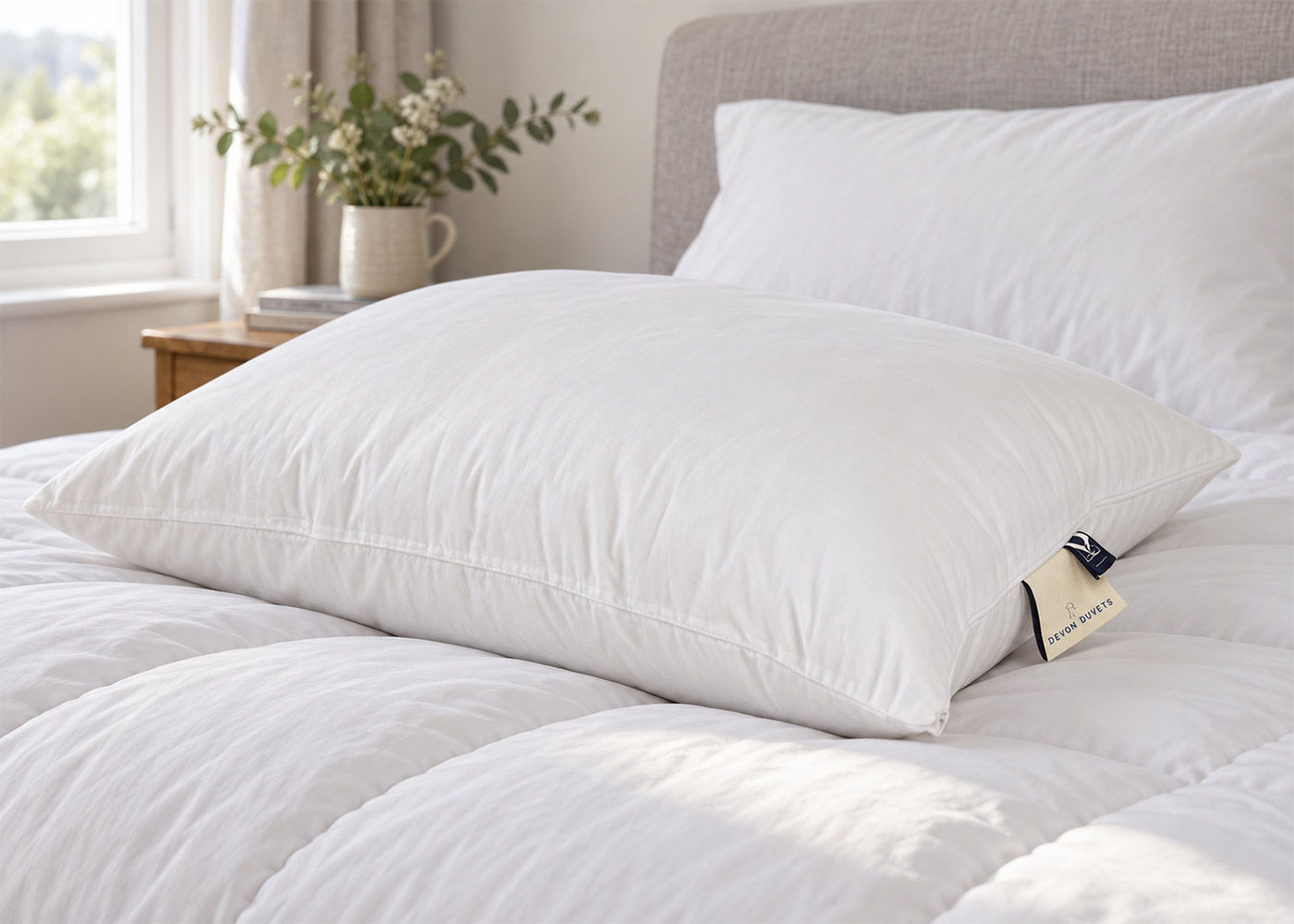 Handcrafted wool pillow arranged on a calm bed for natural comfort and support